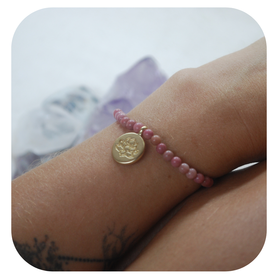 Rhodochrosite hand mala with Lotus pendant