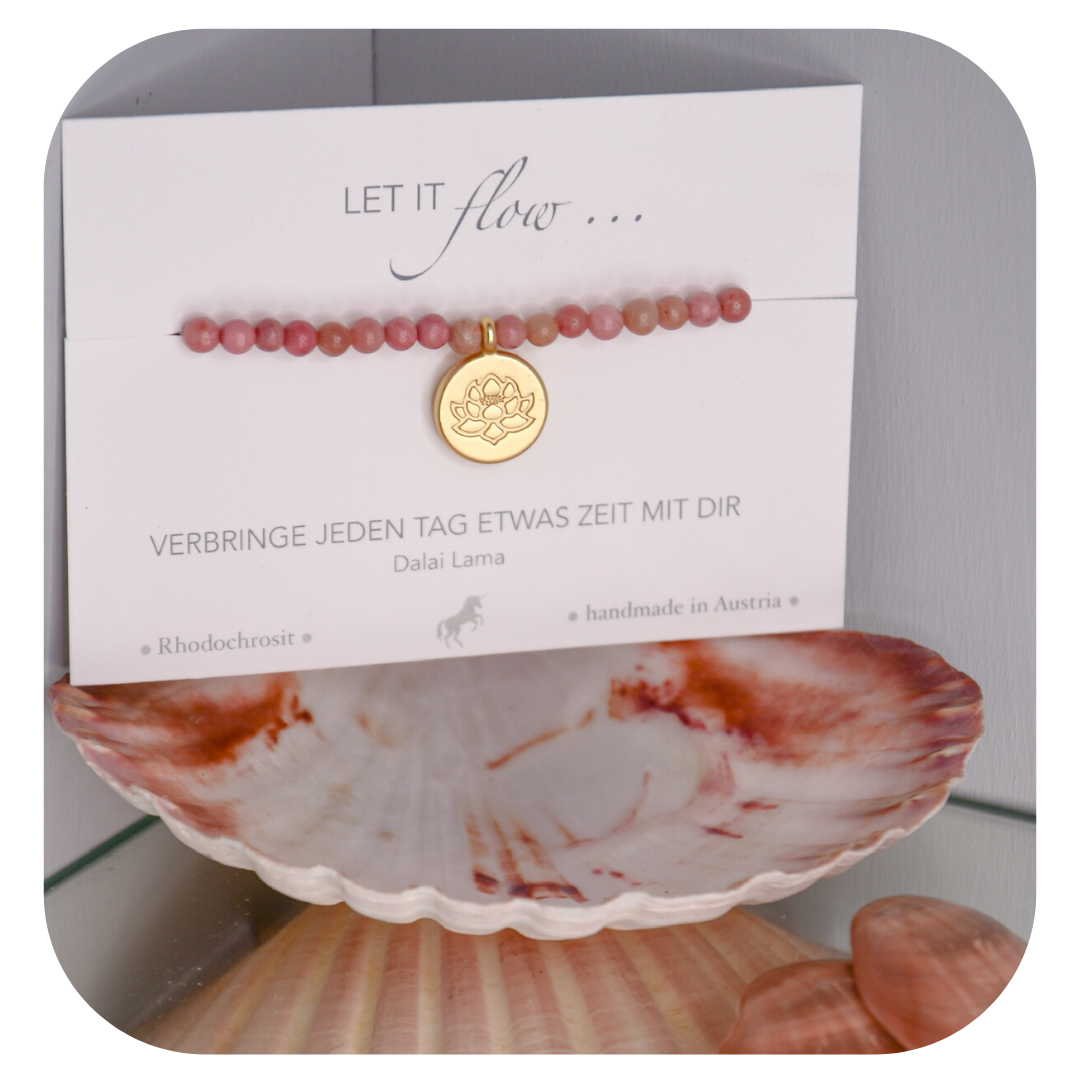 Rhodochrosite hand mala with Lotus pendant