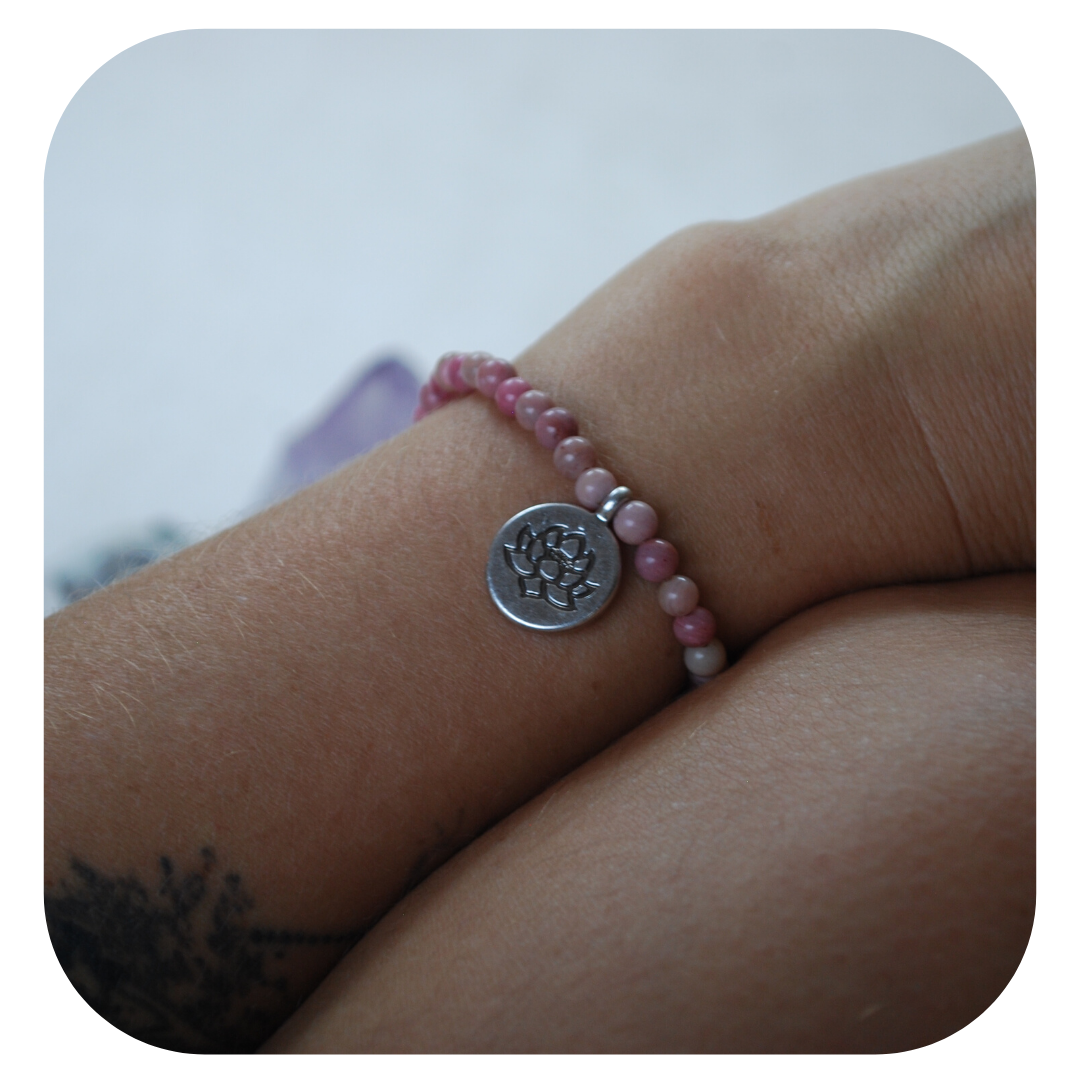 Rhodochrosite hand mala with Lotus pendant